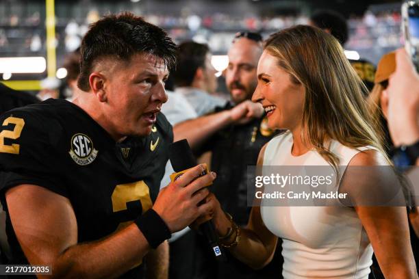 Diego Pavia of the Vanderbilt Commodores is interviewed by Alyssa Lang after his win against the Alabama Crimson Tide at FirstBank Stadium on October...