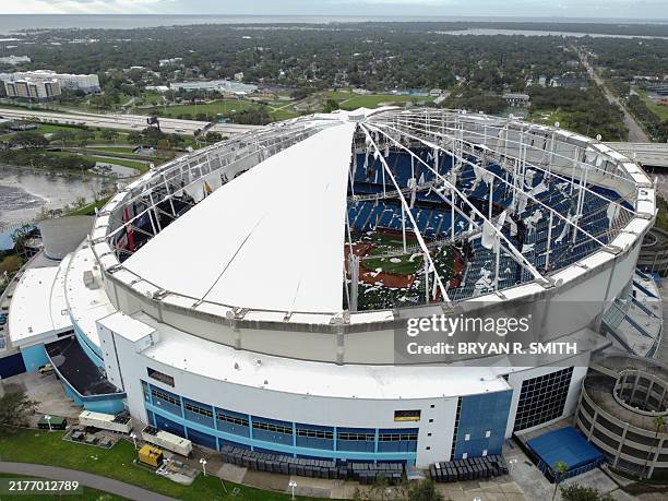 Drone image shows the dome of Tropicana Field which has been torn open due to Hurricane Milton in St. Petersburg, Florida, on October 10, 2024. At...