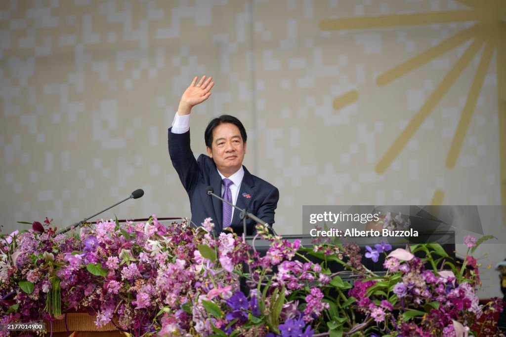 President William Lai ( Lai Ching-te) waves to the crowd...