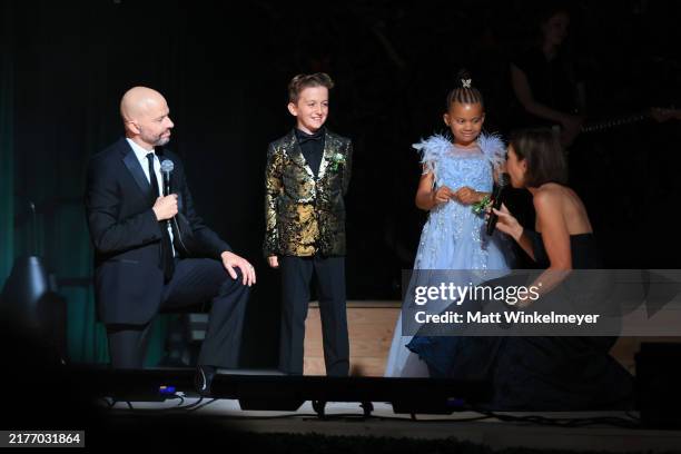 Jon Cryer, Pierce Kelly, Ella Nelson and Lisa Joyner speak onstage during the Children's Hospital Los Angeles Gala 2024 at JW Marriott LA Live on...