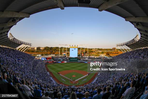 High, wide view from above as fighter jets flyover during the national anthem before game 3 of the ALDS between the New York Yankees and Kansas City...