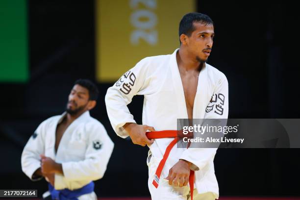 Mohammed Bin Huraymil of Team Saudi Olympic looks on against Abdulmalik Al Murdhi of Team Saudi Olympic and Paralympic Committee in the Men's -77 Jiu...