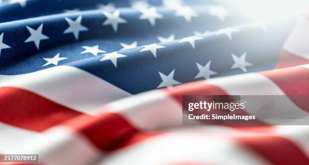 american symbol of 4th of july independence day democracy and patriotism. - wind flag stock pictures, royalty-free photos & images