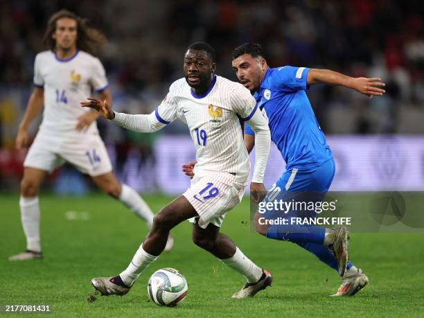 France's midfielder Youssouf Fofana and Israel's midfielder Ethane Azoulay vie for the ball during the UEFA Nations League League A Group A2 football...