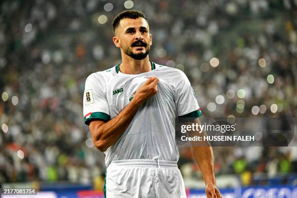 Iraq's forward Aymen Hussein celebrates scoring his team's first goal during the 2026 FIFA World Cup Asian qualification football match between Iraq...
