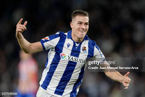 Luka Sucic of Real Sociedad celebrates after scoring their first side goal during the LaLiga match between Real Sociedad and Atletico de Madrid at...