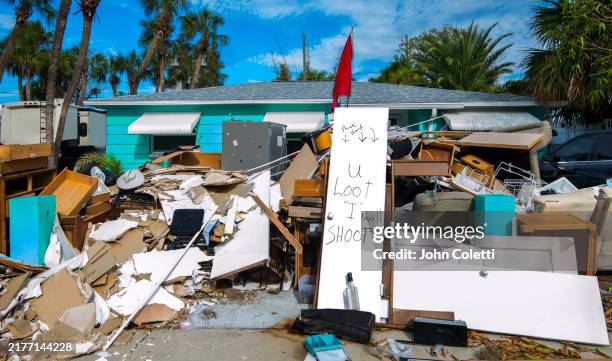 piles of flooded debris, hurricane helene, st pete beach - tropical storm helene 2024 stockfoto's en -beelden