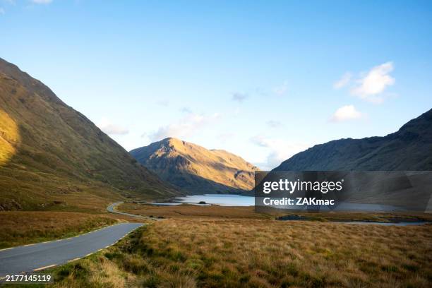 mountains and lakes of connemara in sunset. commemara is in county mayo, ireland - connacht province stock pictures, royalty-free photos & images