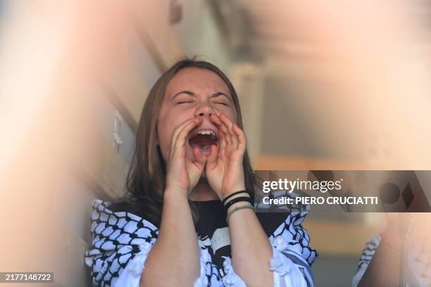 Swedish climate activist Greta Thunberg shouts slogans as she takes part in the Fridays For Future demonstration in Milan, on October 11, 2024.