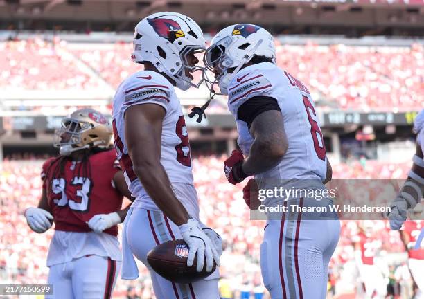 Elijah Higgins and James Conner of the Arizona Cardinals celebrate a fourth quarter touchdown against the San Francisco 49ers at Levi's Stadium on...