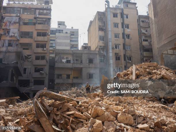 Lebanese Civil Defense and civilians in the middle of the rubbles following the Israeli attacks during the night of October 11th in Basta, Beirut.