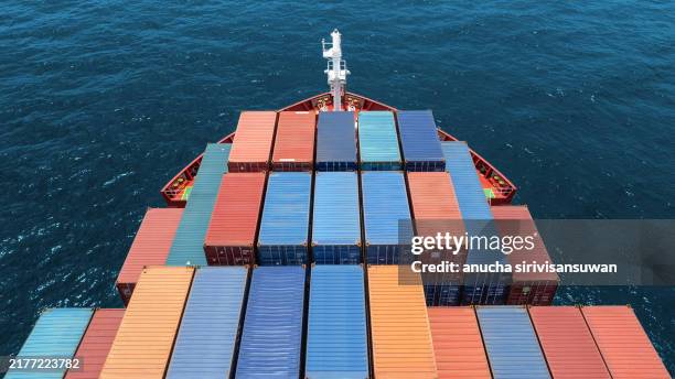 aerial view of cargo ship runing on sea close warehouse harbor at thailand . - industrial sailing craft stock pictures, royalty-free photos & images