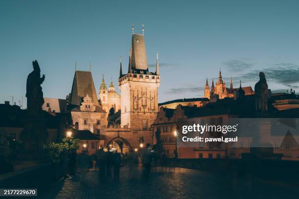 lesser town bridge tower on charles bridge in male strana district of prague city during sunset, czech republic - prague castle stock pictures, royalty-free photos & images