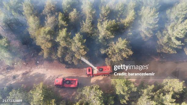 firefighters combat wildfire from above - fire engine isolated stock pictures, royalty-free photos & images