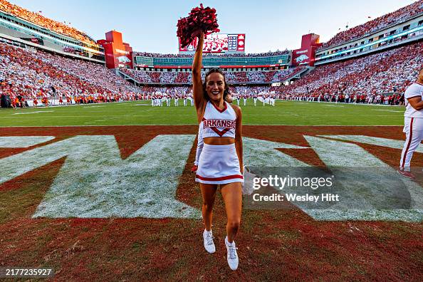 Arkansas Razorbacks Cheer Cheerleaders and band of the Arkansas Razorbacks perform for the fans ...