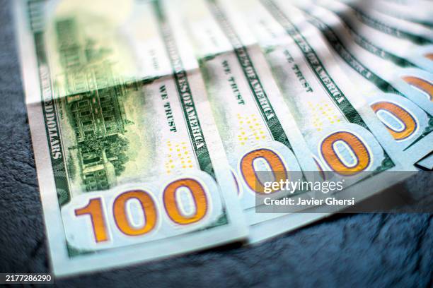 bills of 100 dollars in cash. american money. - international monetary fund stock pictures, royalty-free photos & images