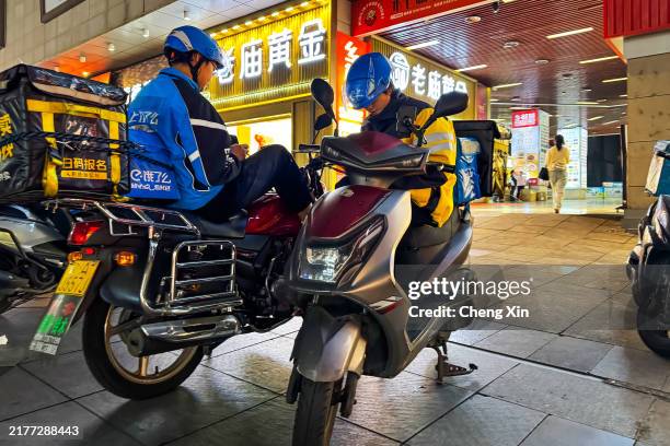 Chinese Delivery Riders 264 China Delivery Scooter Stock Photos, High-Res Pictures, and Images ...