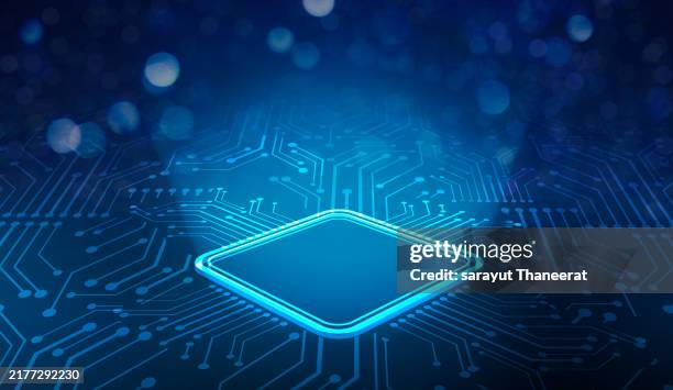 a close-up view of a computer circuit board featuring a central processing unit (cpu) surrounded by various electronic components and intricate wiring. - mother board stock pictures, royalty-free photos & images