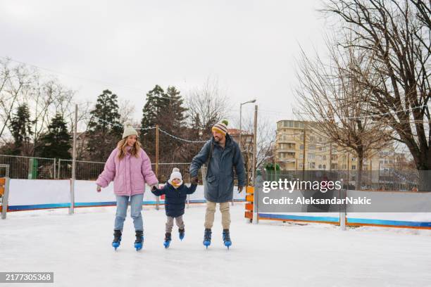 parents and son enjoying ice skating - ice skating stock pictures, royalty-free photos & images