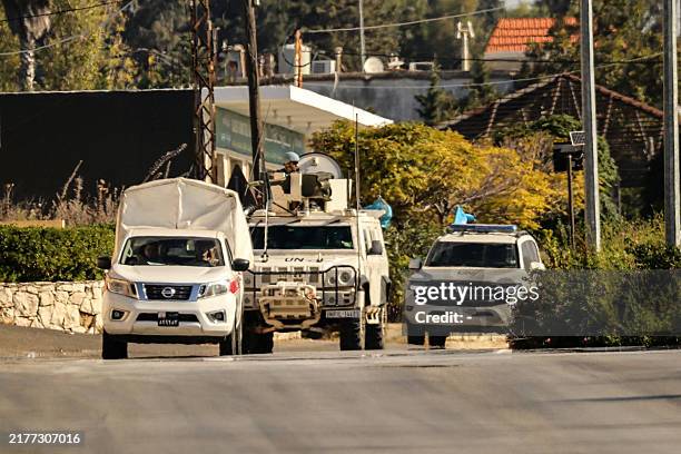 Vehicles from the United Nations Interim Force in Lebanon patrol in Marjayoun in southern Lebanon on October 12, 2024. UNIFIL, which says it has come...