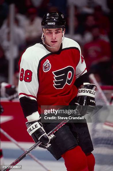 Lindros Forward Eric Lindros of the Philadelphia Flyers looks back to the ...