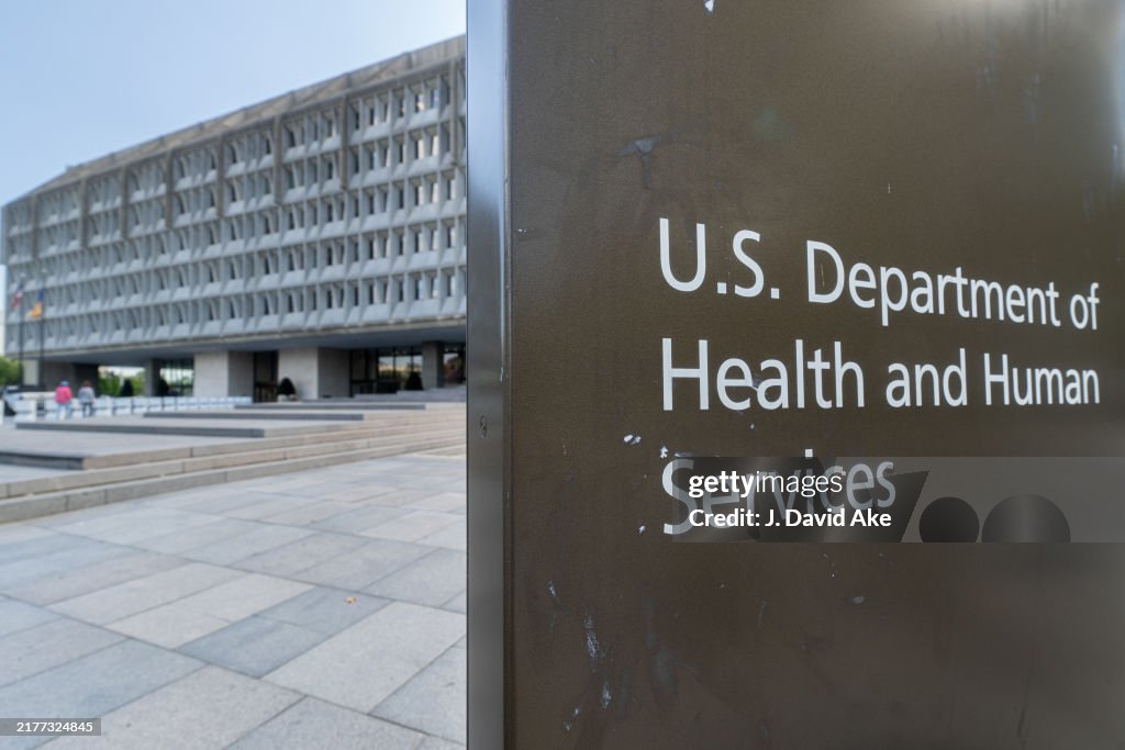 Hhs Building A sign marks the entrance to the U.S. Department of Health and Human ...