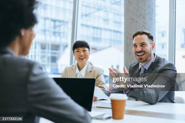 business team having a formal meeting - finance director stock pictures, royalty-free photos & images