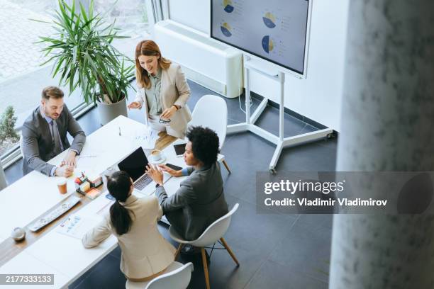 top view of an office business discussion - customer service bildbanksfoton och bilder