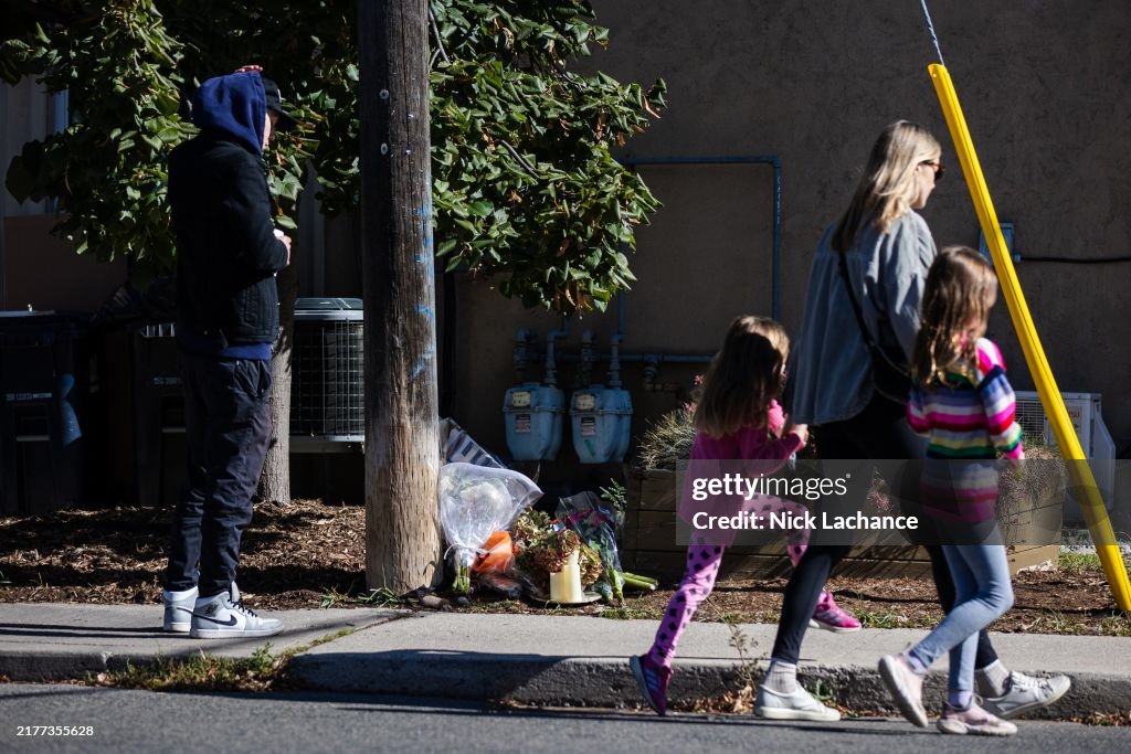 A small memorial on the North east corner of Kingswood Road and Kingston Avenue marks the spot where a 22 year old woman was struck by a bus.
