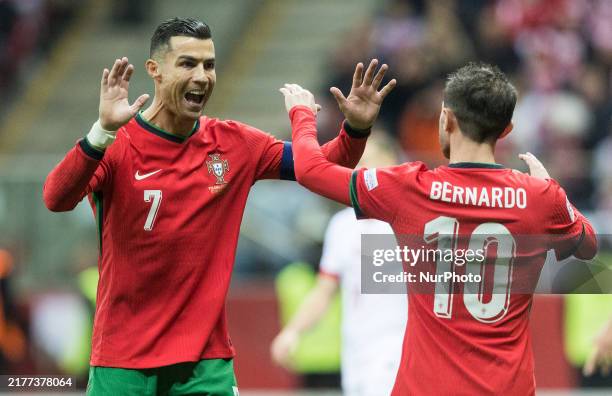 Cristiano Ronaldo , Bernardo Silva , goal celebration during UEFA Nations League match Poland vs Portugal in Warsaw Poland on 12 October 2024.
