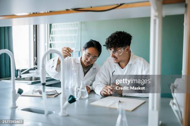 College Students In Lab 4,293 Male College Student Science Lab Stock Photos, High-Res Pictures ...