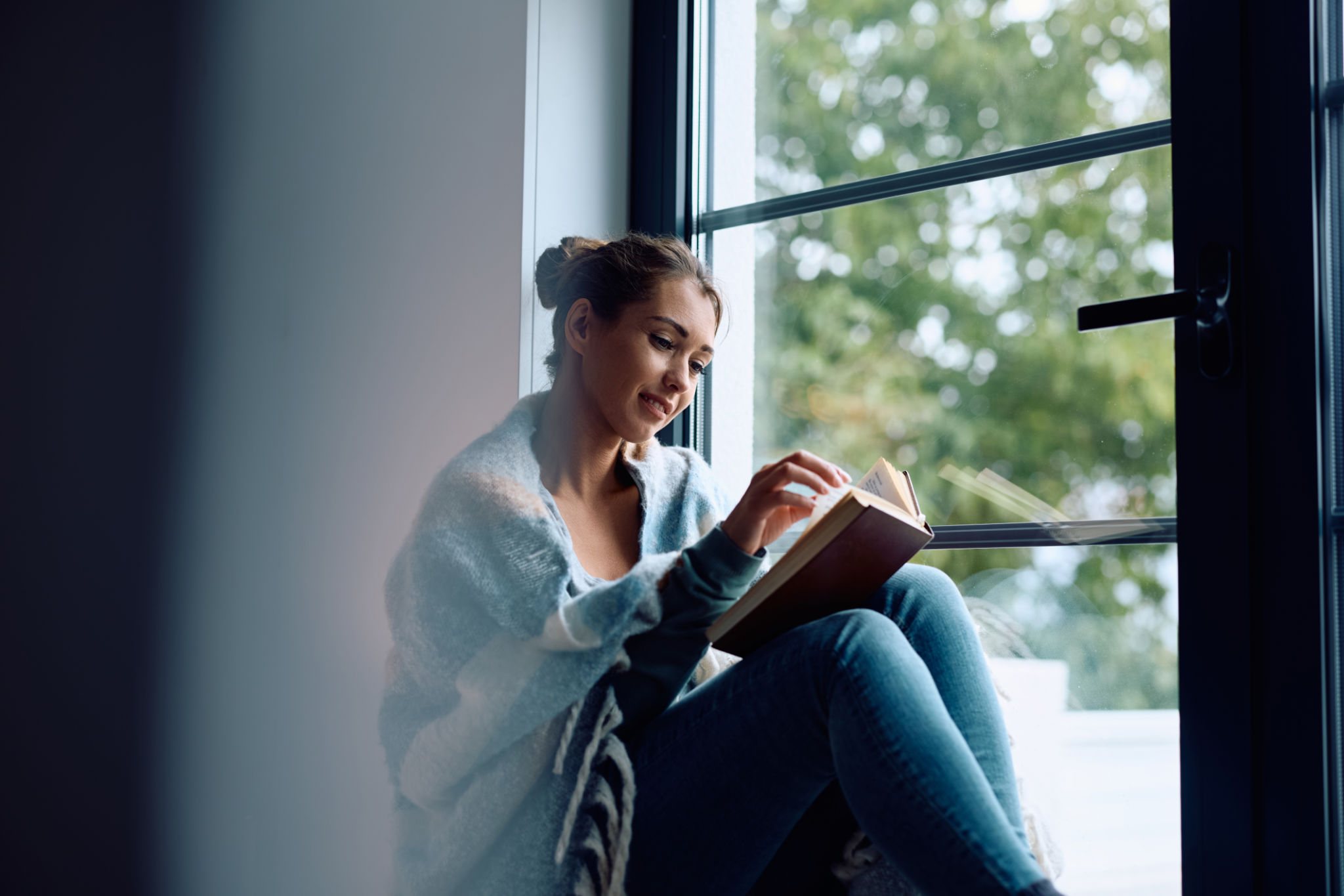 woman reading book