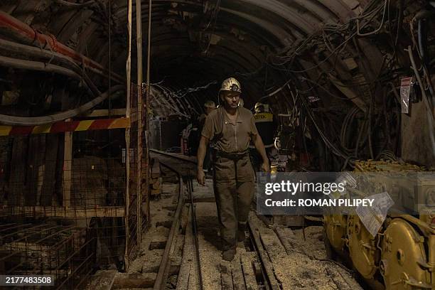 Miners work underground in a coal mine in the western part of Donbas, on October 11 amid the Russian invasion of Ukraine. Attacks by Russia have...