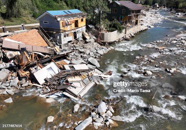 An aerial view of destroyed and damaged buildings in the aftermath of Hurricane Helene flooding on October 8, 2024 in Bat Cave, North Carolina. Bate...