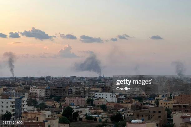 Smoke billows during air strikes in central Khartoum as the Sudanese army attacks positions held by the paramilitary Rapid Support Forces throughout...