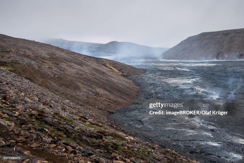 Smoking lava flows at the table volcano Fagradalsfjall, Krýsuvík volcanic system, Reykjanes Peninsula, Iceland, Europe