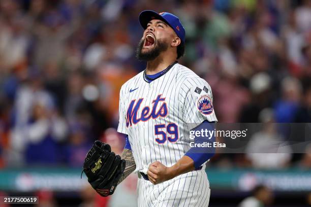 Sean Manaea of the New York Mets reacts after a double play to end the sixth inning against the Philadelphia Phillies during Game Three of the...