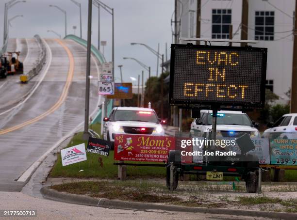 Sign indicates that an evacuation order is in effect for the beach area before Hurricane Milton's arrival on October 08 in Fort Myers, Florida....