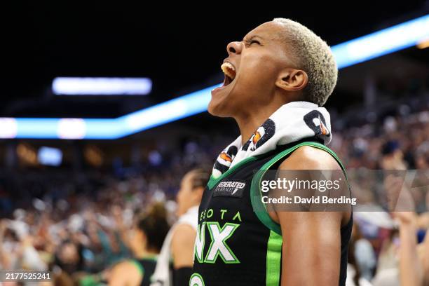 Courtney Williams of the Minnesota Lynx celebrates against the Connecticut Sun in the fourth quarter of Game Five of the Semi-Finals during the WNBA...