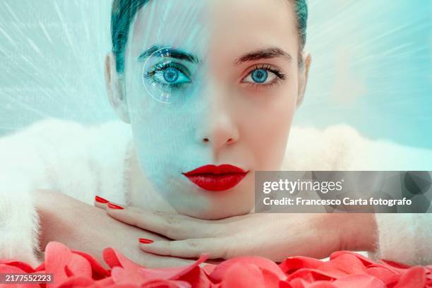 beautiful woman with advanced technology in her eye. - cyborg eye stock pictures, royalty-free photos & images