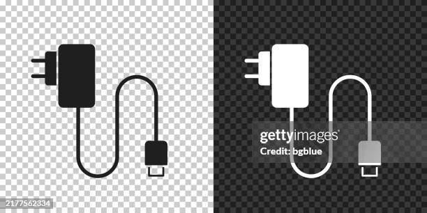 mobile phone charger. icon for design on blank background - mobile phone charger stock illustrations