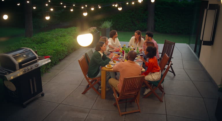 https://media.gettyimages.com/id/2177574420/video/group-of-multiethnic-diverse-people-having-fun-communicating-with-each-other-and-eating.jpg?b=1&s=640x640&k=20&c=eUUeFodc9JI9WkPzZW7UAUlSzIFfR4ipUVW050fspU0=