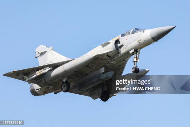 Taiwanese Air Force Mirage 2000 fighter jet prepares to land at an air force base in Hsinchu on October 14, 2024. China deployed planes and ships to...