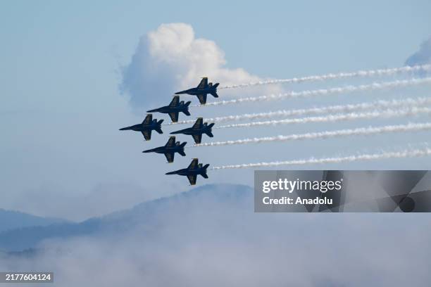 Blue Angels fly over San Francisco City during Fleet Week Air Show in San Francisco, California on October 13, 2024.