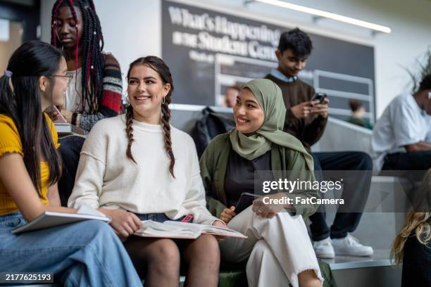 between classes - literacy stock pictures, royalty-free photos & images