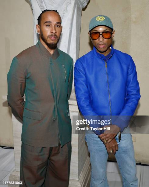 Lewis Hamilton and Pharrell Williams attend a press conference announcing the Spring 2025 Costume Institute exhibition "Superfine: Tailoring Black...