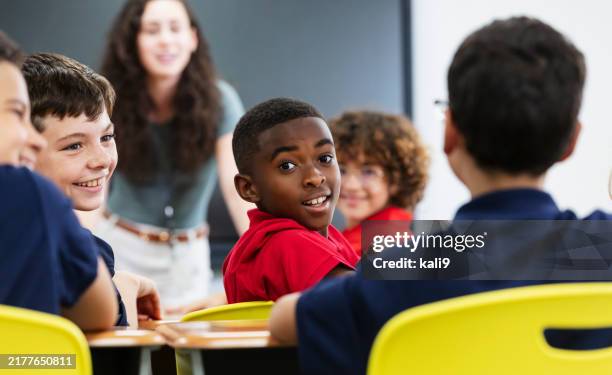 multiracial elementary school students in classroom - classroom observation stock pictures, royalty-free photos & images