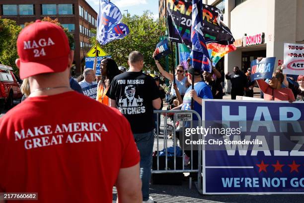 Supporters of Democratic presidential nominee, Vice President Kamala Harris rally as supporters of Republican presidential nominee, former President...