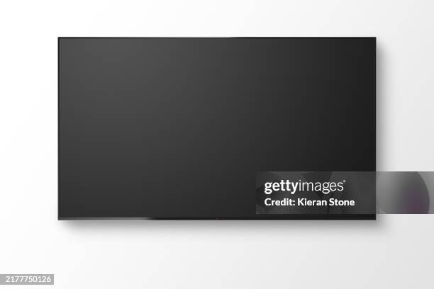 wall mounted blank tv with screen off - flat screen television stock pictures, royalty-free photos & images