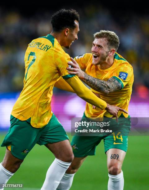 Nishan Velupillay of the Socceroos celebrates after scoring his teams third goal with Riley McGree of the Socceroos during the third round FIFA World...